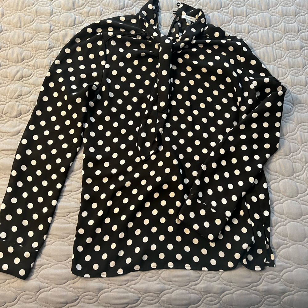 Black and white polkadots blouse from TRISTAN